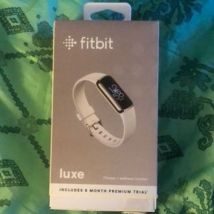 Open box Fitbit luxe fitness and wellness tracker, lunar white band & soft gold